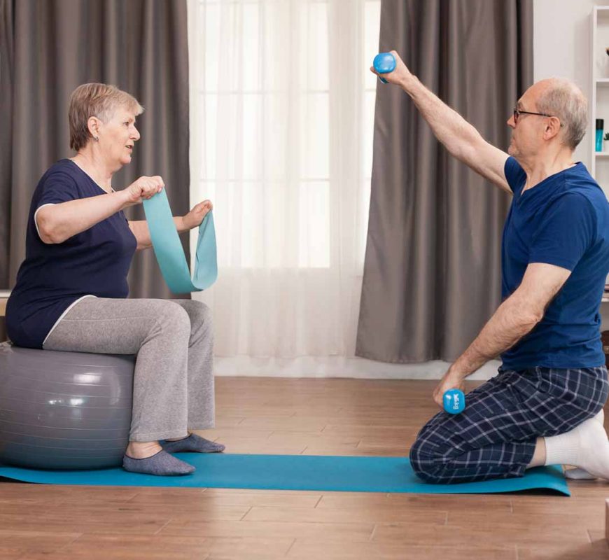 Elder people exercising together