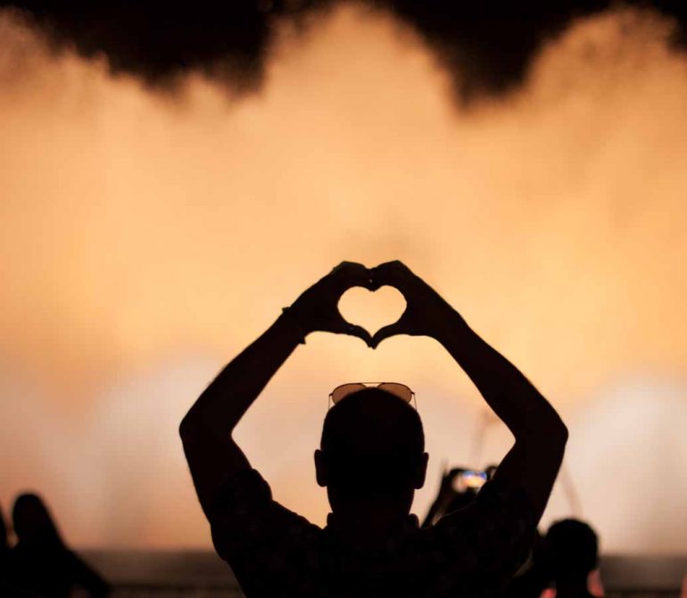 Man expressing love with his hand